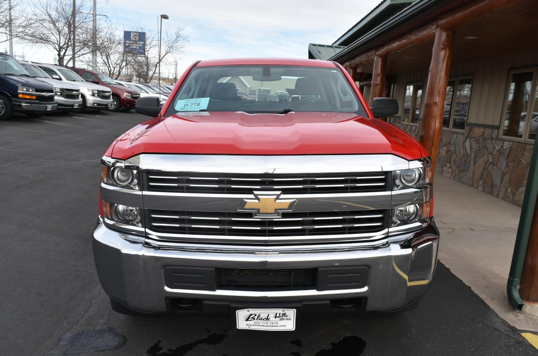 2015 Red /Gray Chevrolet Silverado 2500 HD (1GC1KUEG2FF) with an 6.0L Vortec V8 Varaible Valve Timing SFI engine, 6-Speed Automatic Heavy-Duty, Electronically Controlled transmission, located at 1600 E Hwy 44, Rapid City, SD, 57703, (605) 716-7878, 44.070232, -103.171410 - Photo #1